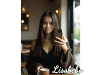 a woman is taking a selfie with her phone and the name lisbeba is on the bottom