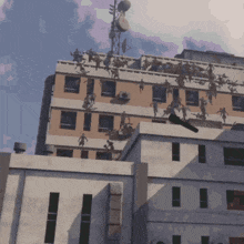 a building with a bunch of people on it