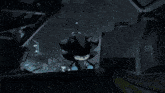 a blurry picture of a person standing in a dark room