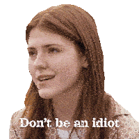 a woman with red hair is smiling with the words " don 't be an idiot " below her
