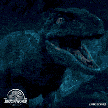 a poster for jurassic world shows a shark swimming underwater