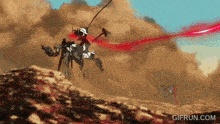 a gif from gifrun.com shows a battle between a robot and a human