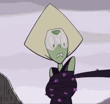 peridot from steven universe is tied up with a purple ribbon .