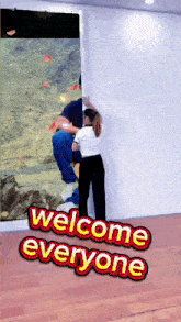 a poster that says welcome everyone with a man and woman standing next to each other