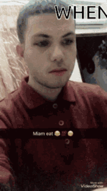 a man in a red shirt is making a funny face and the caption says " when miam eat "