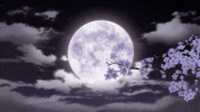 a full moon is behind a cherry blossom tree with flowers