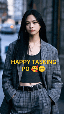 a woman wearing a suit and a crop top with the words happy tasking po on the bottom