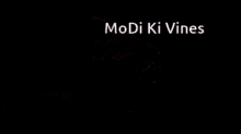 a man and a woman are sitting on a bed and the words modi ki vines are above them