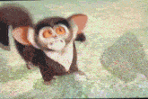 a cartoon monkey with big orange eyes is standing on a grassy field