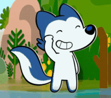 a cartoon drawing of a blue and white animal with a big smile on its face