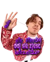 a man in a red paisley jacket is holding a pink ribbon in his mouth