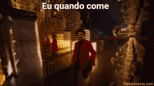 a man in a red jacket is dancing in a dark room with the words eu quando come written above him