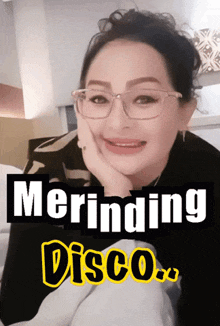 a woman wearing glasses is smiling with the words merinding disco below her