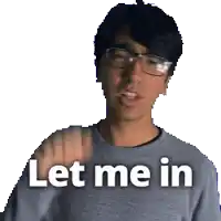 a man wearing glasses and a grey shirt says " let me in "