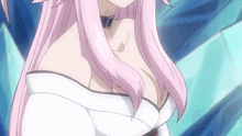 a close up of a woman 's breasts with pink hair
