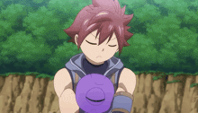 a boy with purple hair is holding a purple object