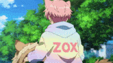 a girl with cat ears is wearing a hoodie that says zox