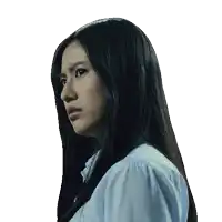 a woman with long black hair wearing a white shirt looks to the side