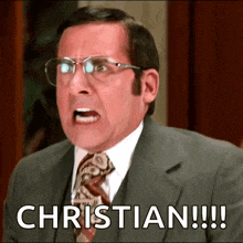 a man in a suit and tie says christian