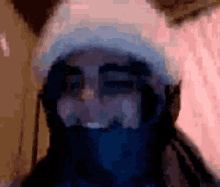 a blurry picture of a person wearing a hat