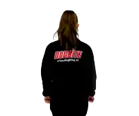 a woman flexes her muscles wearing a black dogbite sweatshirt
