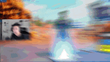 a blurred image of a person standing in front of a building