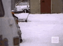 a van is parked in the snow with a sign that says much more on it