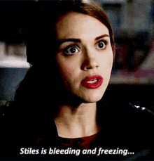 a close up of a woman with the words stiles is bleeding and freezing