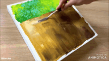 a person is painting a picture on a canvas with the words wow art below it