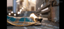 a piece of cloth is on fire on the ground .