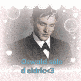 a picture of a man in a suit with the words oswald solo d eldric < 3 below him