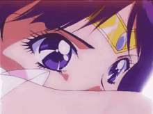 a close up of a girl 's face with purple hair