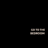 a man is pointing at a closet with the words `` go to the bedroom '' on it .
