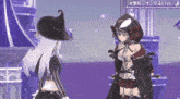 two anime girls are standing next to each other in front of a purple building .