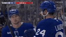 a hockey player with the name mermis on the back of their jersey