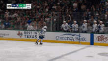 a hockey game is being played in texas and comerica bank is one of the sponsors
