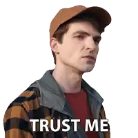 a man wearing a plaid shirt and a hat says " trust me "