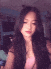 a blurry photo of a woman with long hair