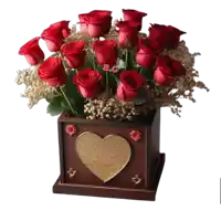 a bouquet of red roses in a wooden box with the initials a.c. on the top