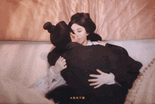 a painting of a woman kissing a man with chinese writing