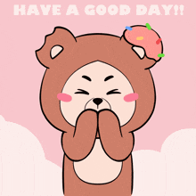 a cartoon bear with its arms outstretched and the words have a good day below it