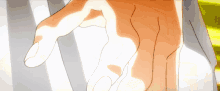 a person 's hand is reaching out towards something
