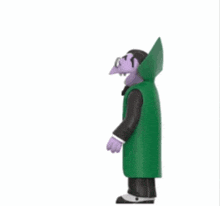 a figurine of count von count from sesame street wearing a black suit and green cape