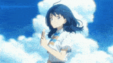 a girl with blue hair is holding an ice cream in her hand