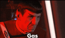 a close up of a man 's face with the word gas above it