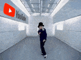 a woman in a top hat is dancing in a room with a youtube logo on the wall