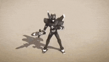 a black and white cartoon character is holding a gun while standing on a sandy surface .