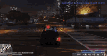 a video game screen shows a police car driving down a street at night