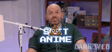 a man sitting in front of a microphone with the words scott anime dark web written on the bottom