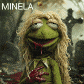 a picture of kermit the frog with blood dripping from his mouth and the word minela above him